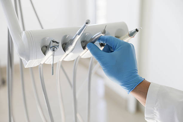 Professional Tooth Extraction technician working in Le Flore County County, OK